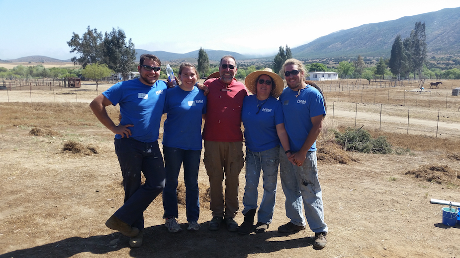 Rugby's Jonathan DiBacco lends his helping hands