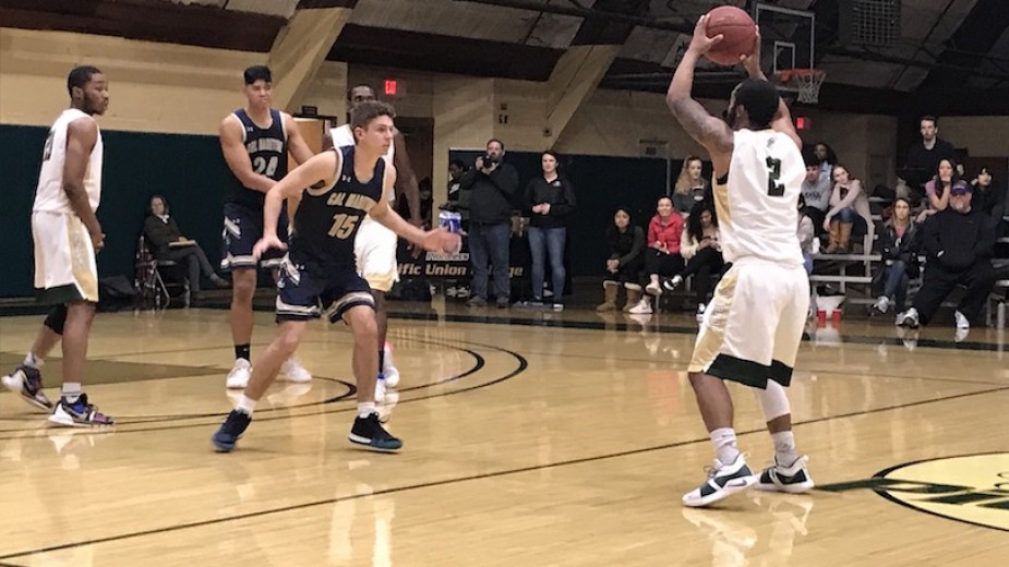 Men's Basketball wins defensive battle at PUC