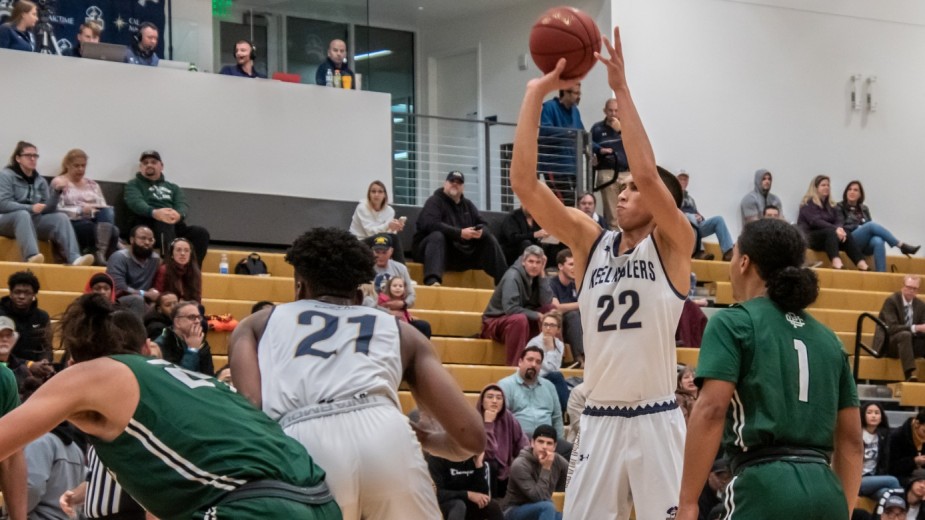 Strong 2nd half propels Men's Basketball to win at PUC