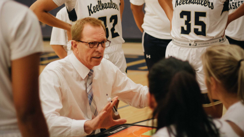 Women's Basketball Head Coach Dennis Cox heads home