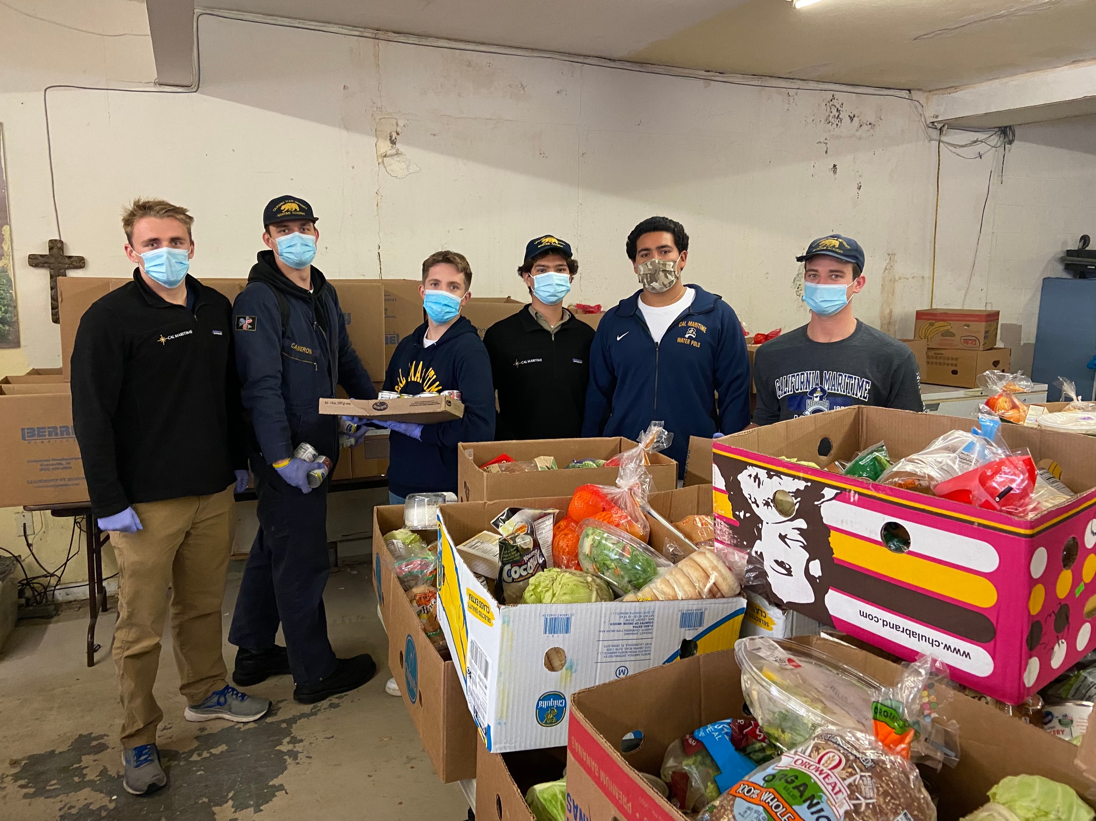 Men's Water Polo partners with Faith Food Fridays for the holiday season